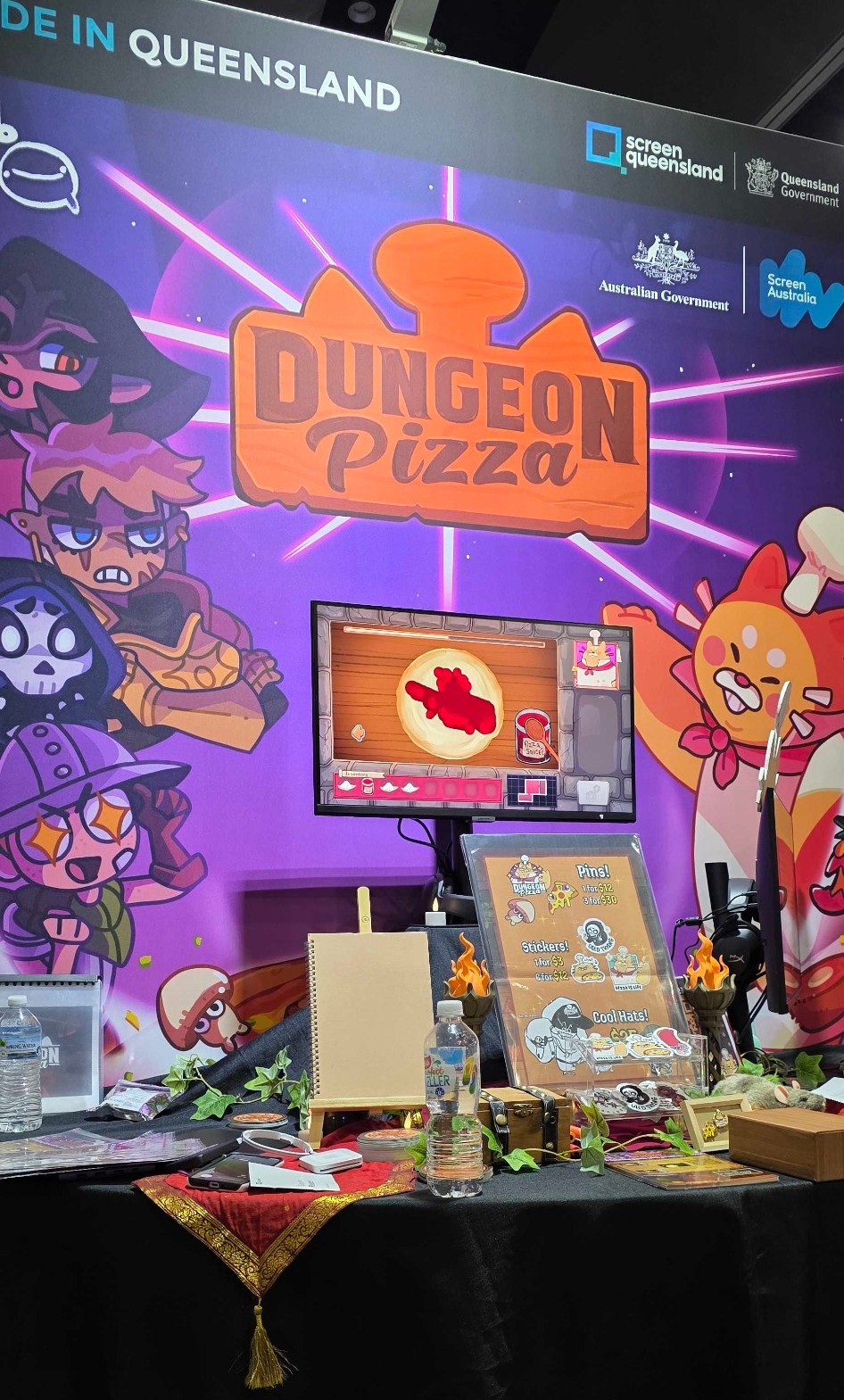 The Dungeon Pizza booth