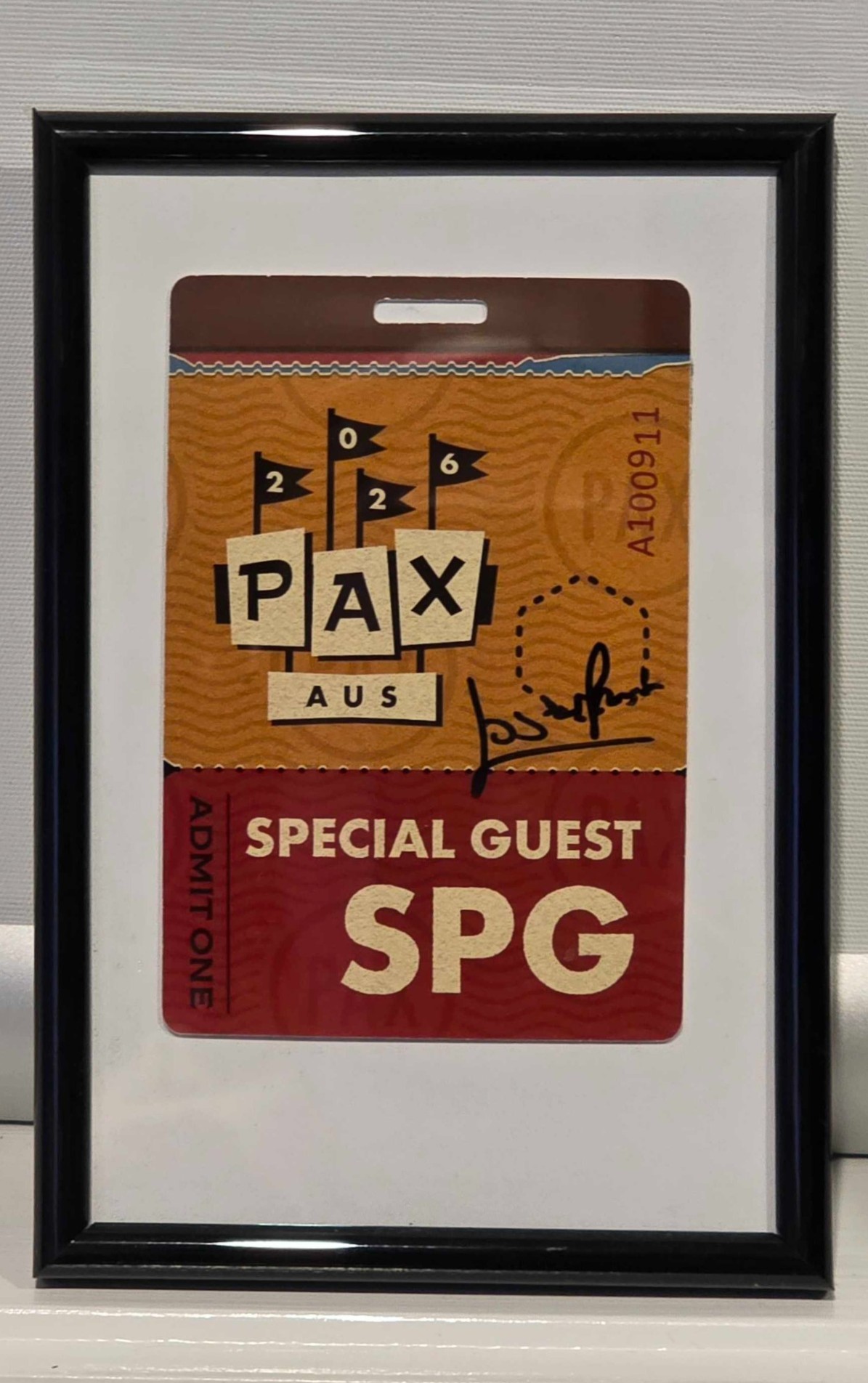 Framed PAX Aus 2026 special guest badge